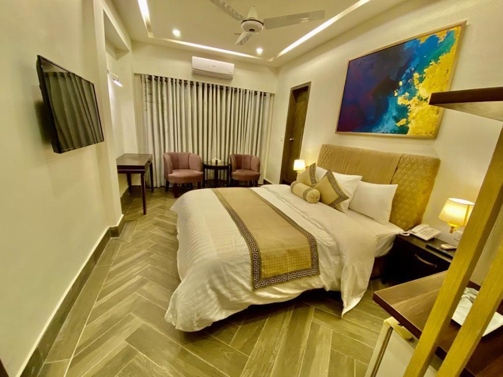Shelton Hotel Mardan Esterno foto